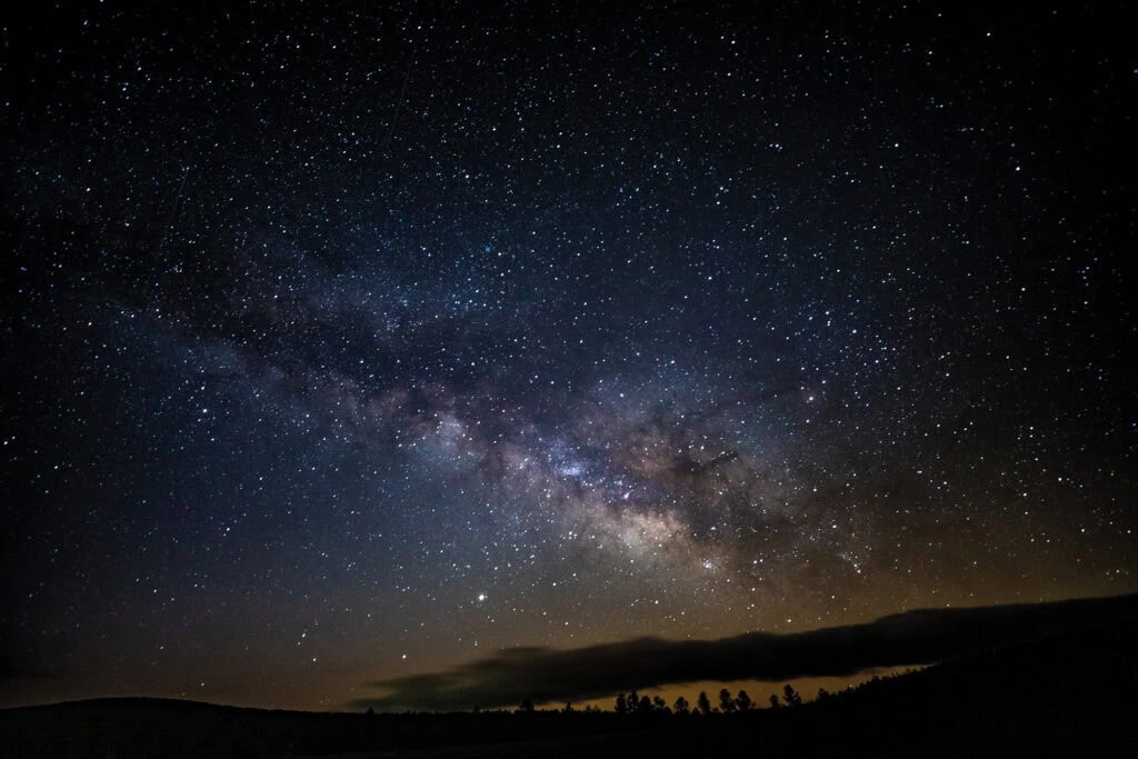 The milky way visible in the night sky.