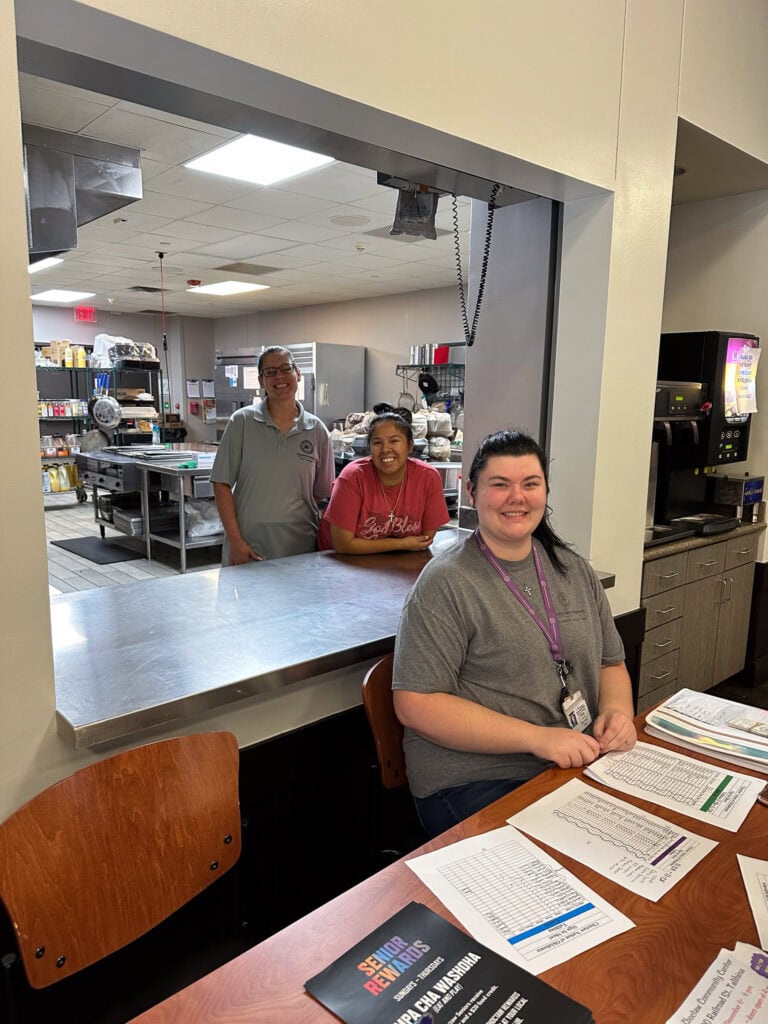 Volunteers pose for a photo.
