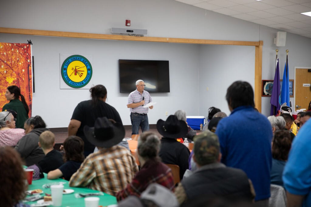 Eddie Bohanan speaks in front of crowd.