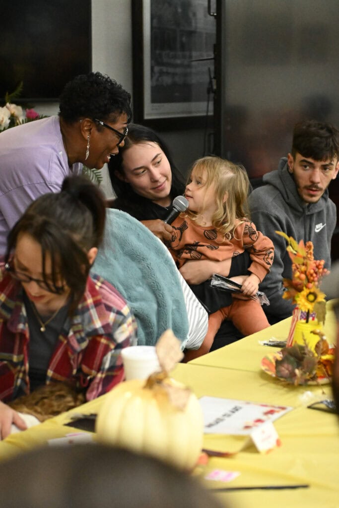 A young Choctaw speaks into a mic.