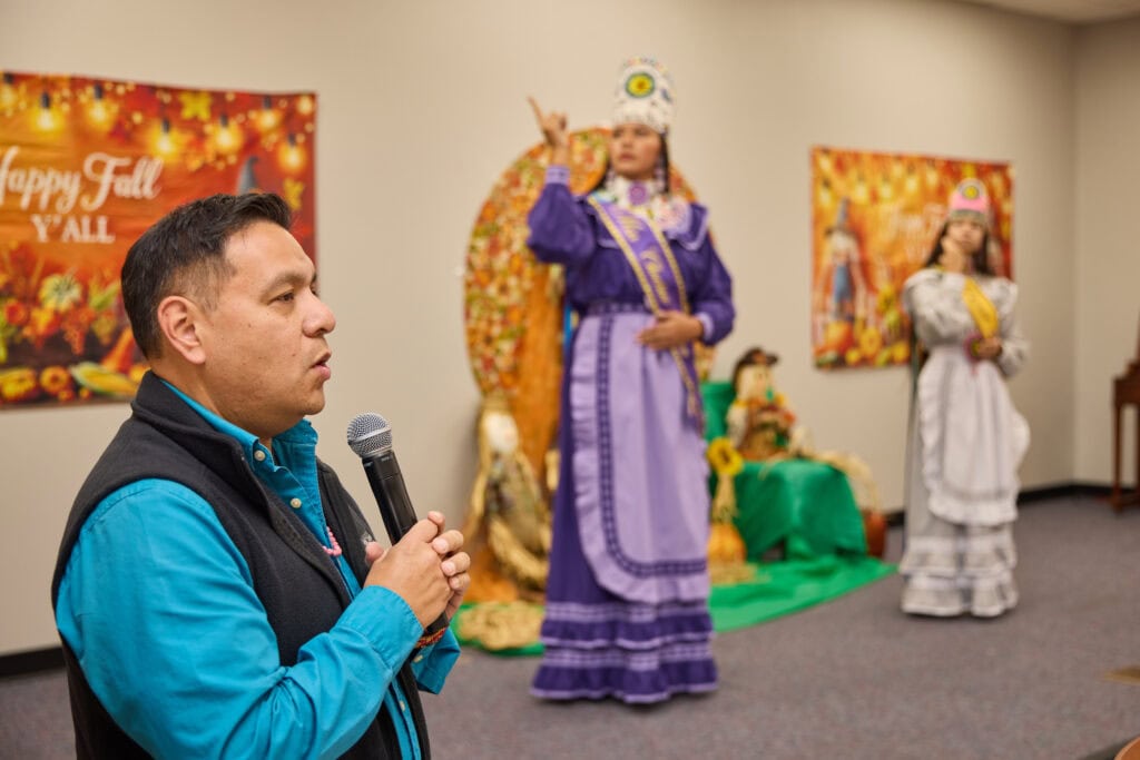 Brad Joe sings the Lord's Prayer as princesses perform.