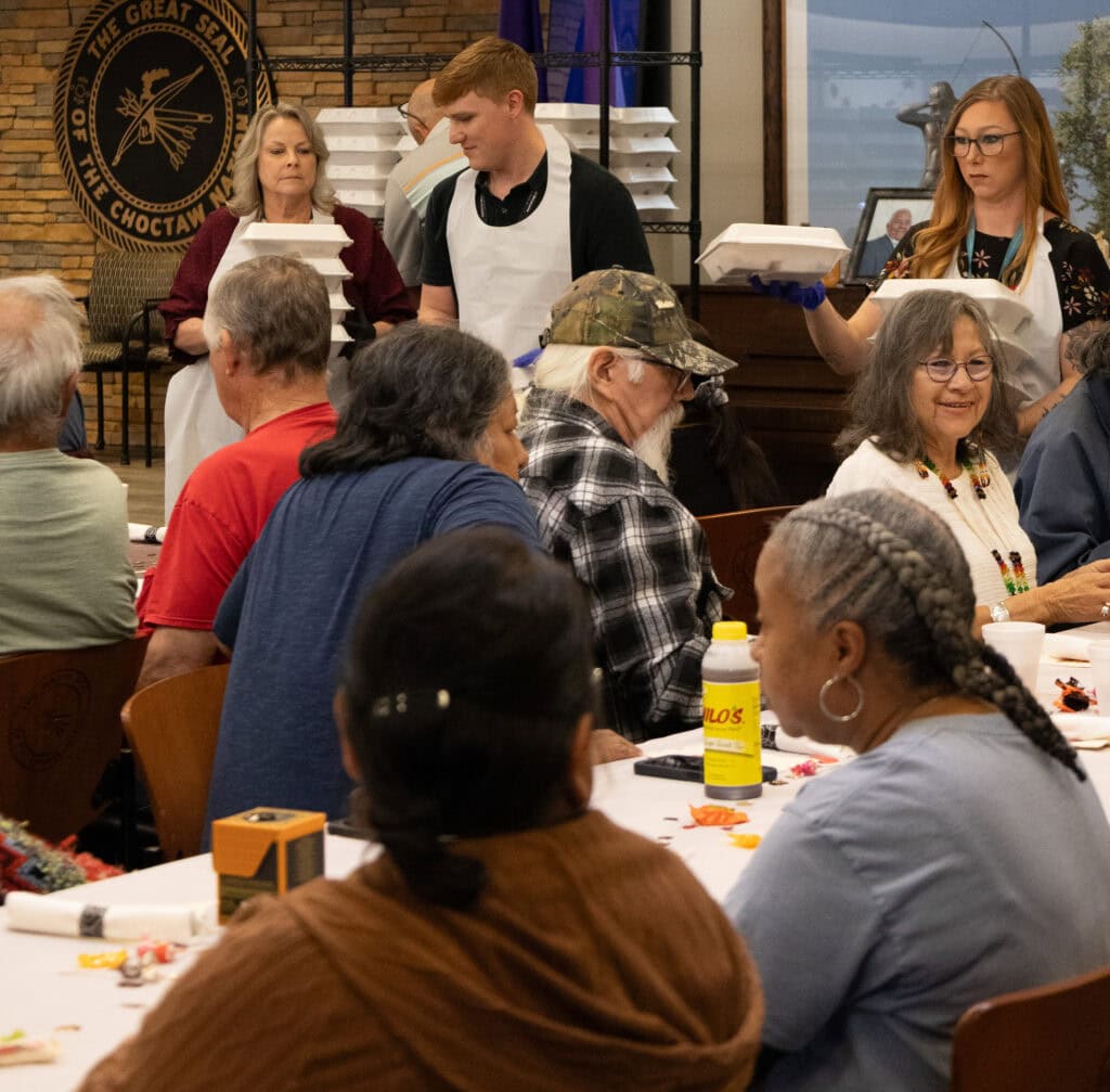 Antler's elders are served meals.