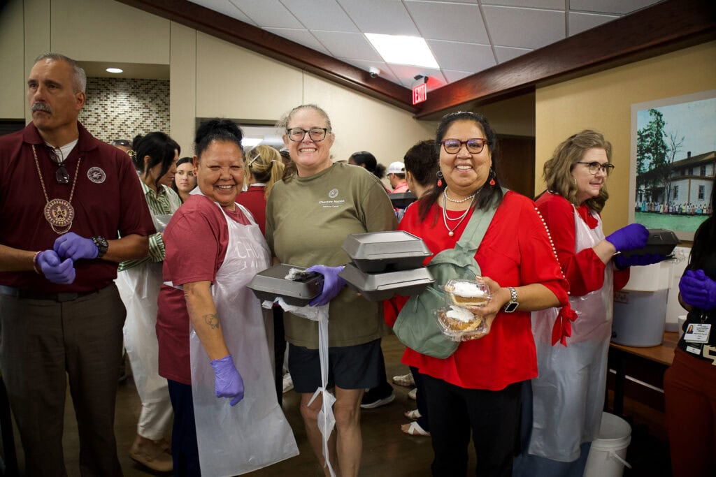 Volunteers pose for a photo.