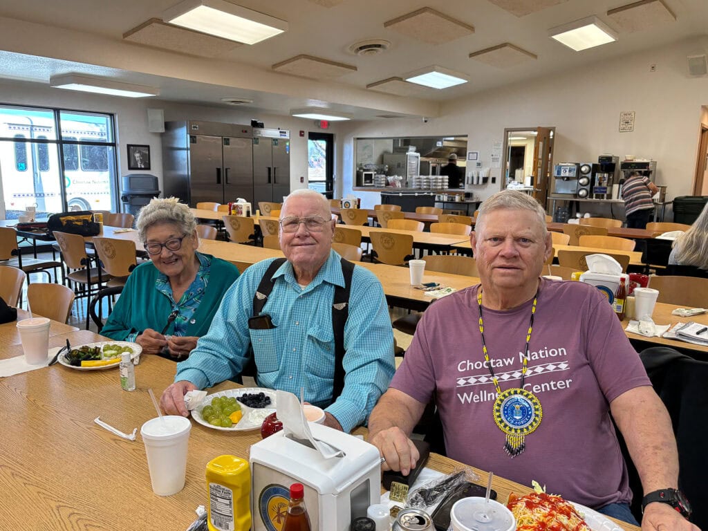 Elders pose for a photo.