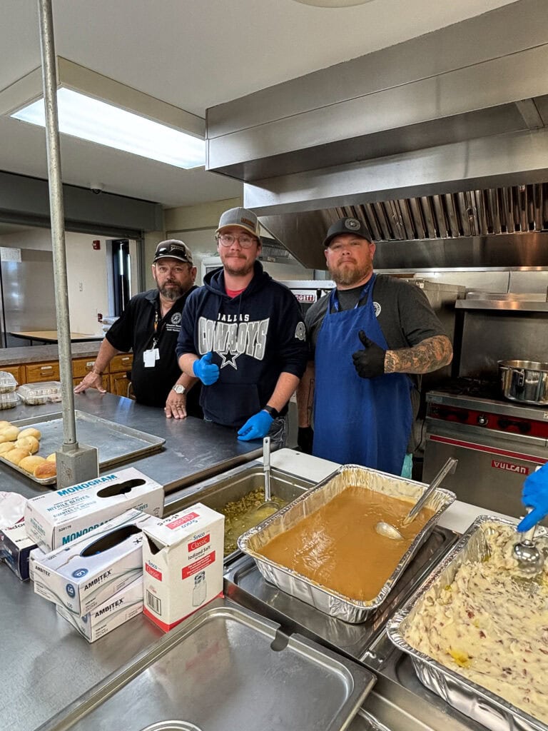 Volunteers pose for a photo.