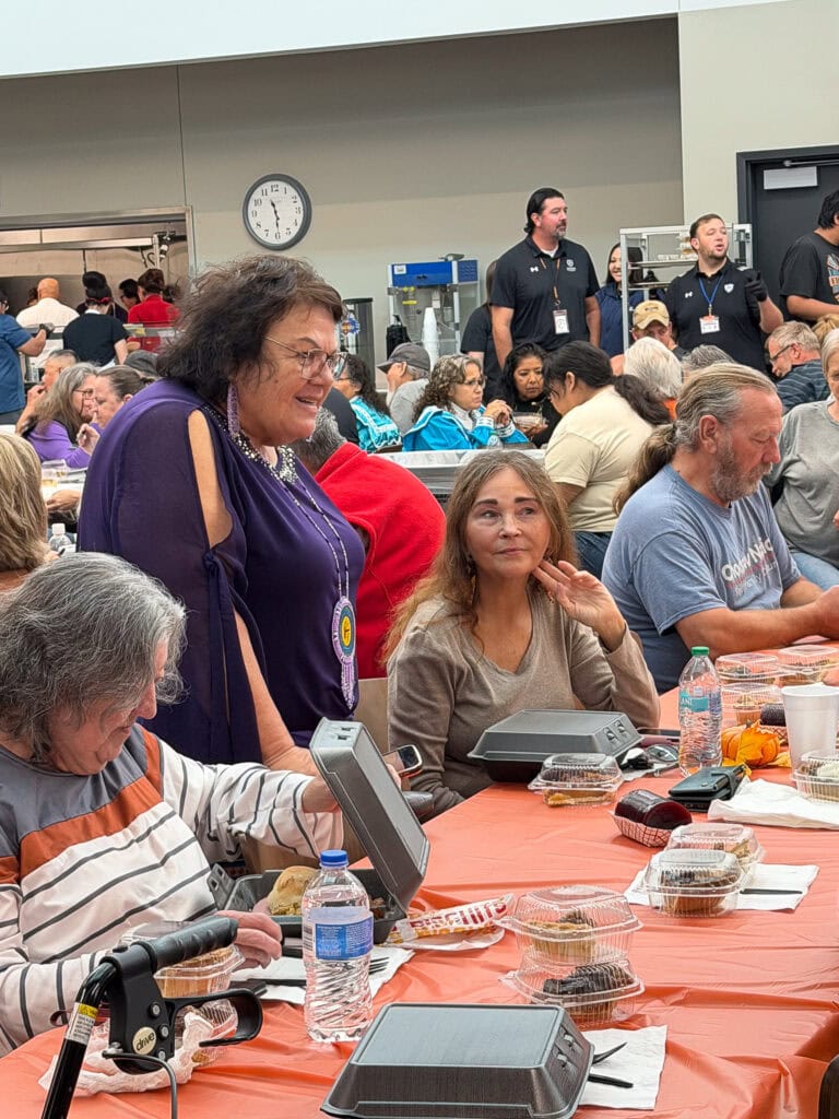 Jennifer Woods speaks to elders.