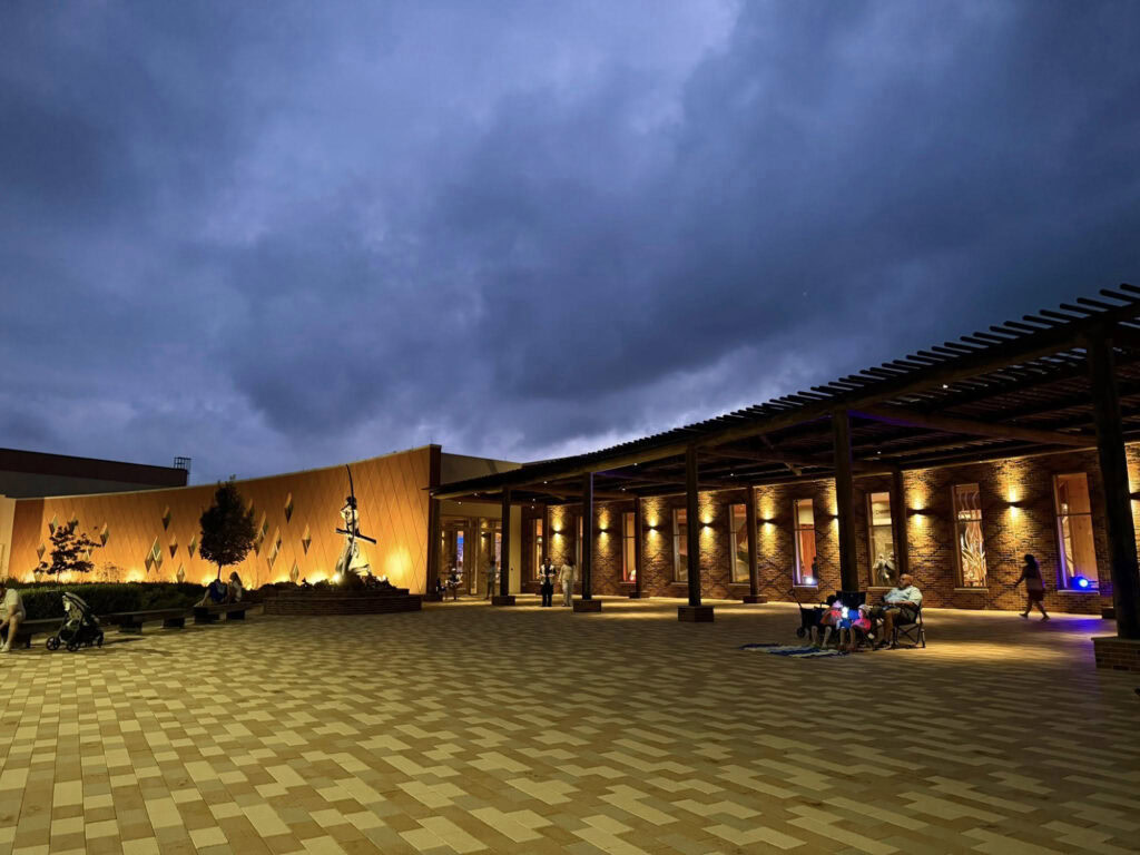 The Choctaw Nation Cultural Center at dusk.