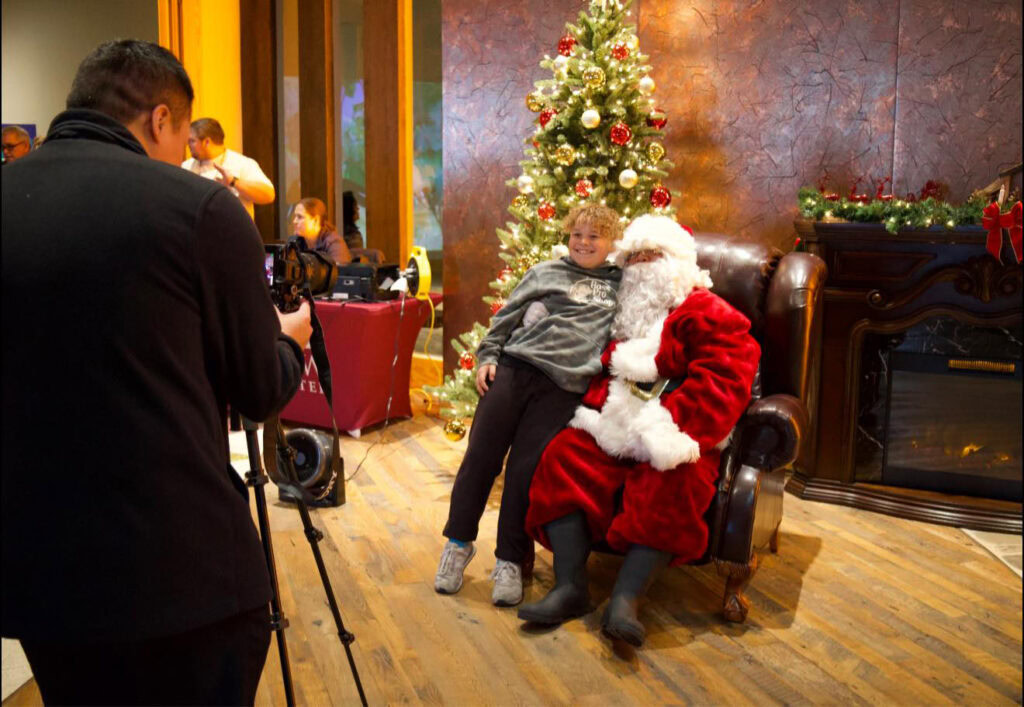 A child visits santa.