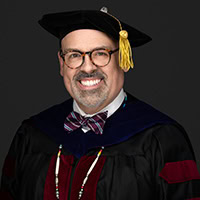 A man poses for a photo.