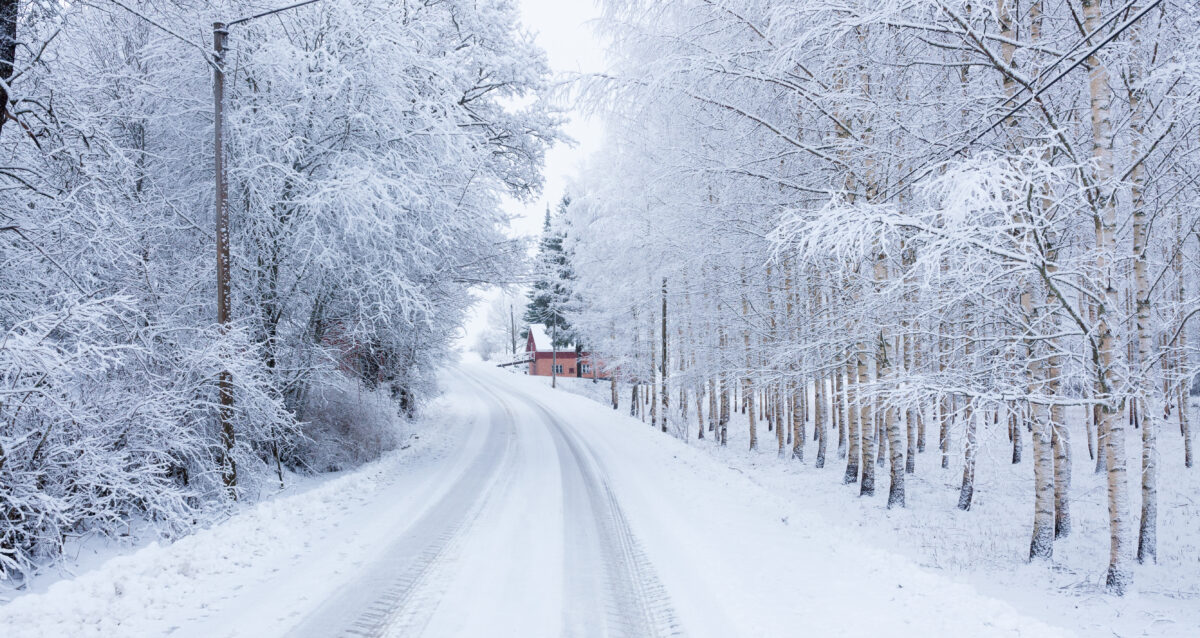 Small road at winter covered in snow.