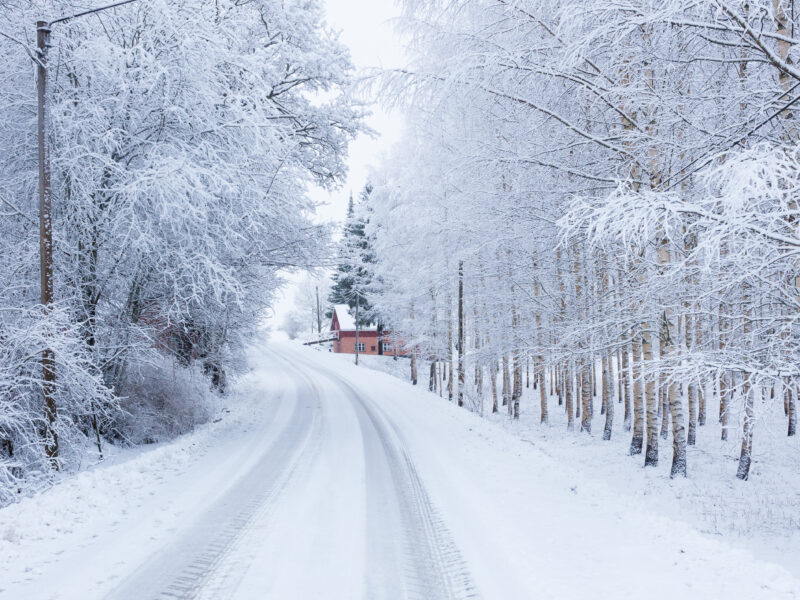 Small road at winter covered in snow.