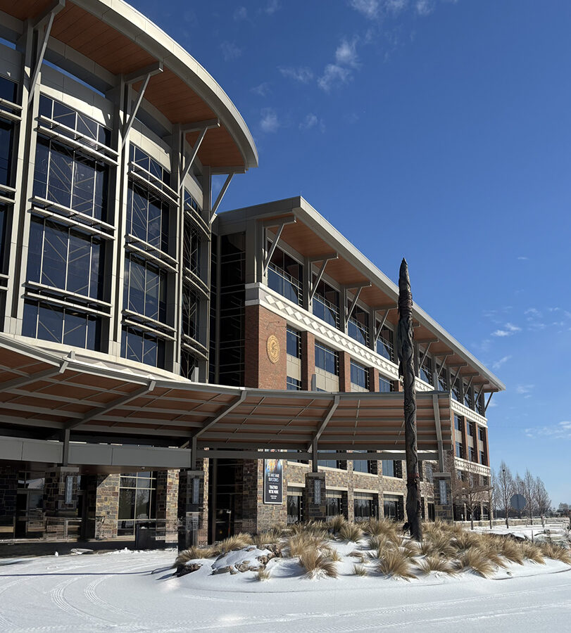 The Choctaw Nation Headquarters with snow covering the ground at the entrance.