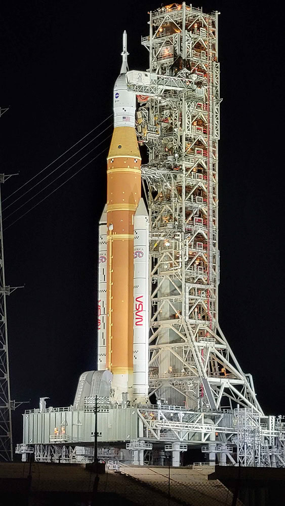 A NASA rocket on the launchpad.