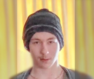 A young man, wearing a beanie.