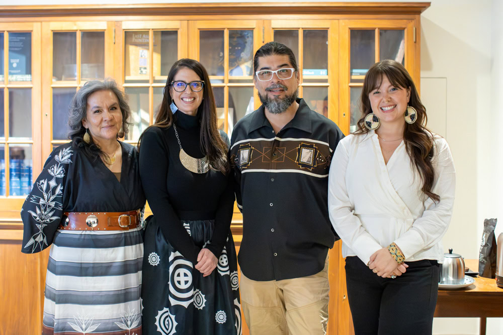 A group of people pose for a photo.