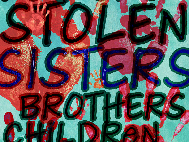 A blue and red poster with the words "No More Stolen Sisters, Brothers, Children, Family" written in black.