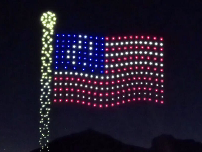 The US flag made from lights on a drone.