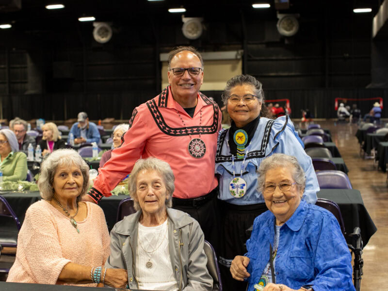 A group of people pose for a photo.