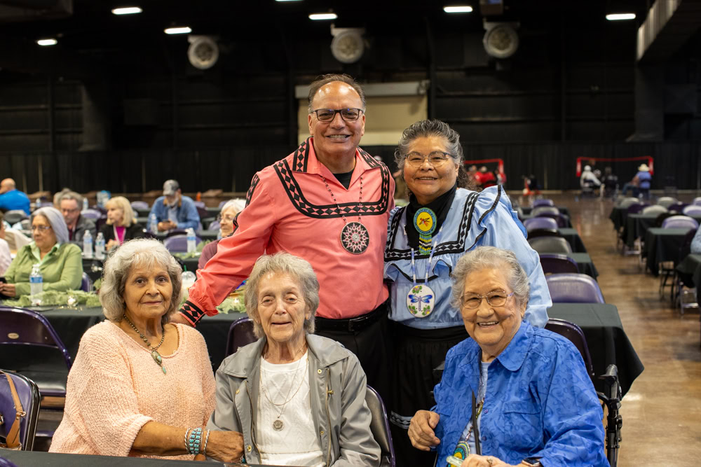 A group of people pose for a photo.