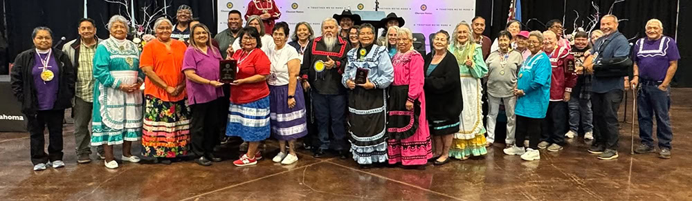 A group of people pose for a photo.