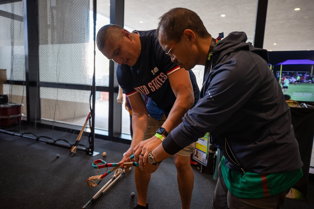 A stickball demonstration is given.
