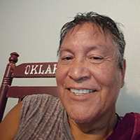 A man poses for a photo.