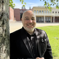 A man poses for a photo.