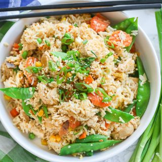 chicken fried rice in white bowl