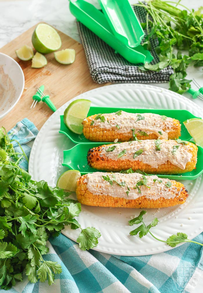 grilled corn on the cob with skinny sauce drizzled on top
