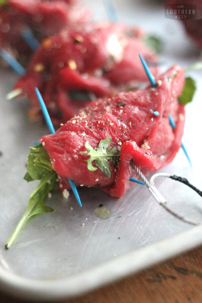 In under 30 minutes, you can prepare this delicious steak goodie that tastes even better than any restaurant could do! This Spicy Cotija Steak Pinwheel recipe is so easy that anyone can do it!