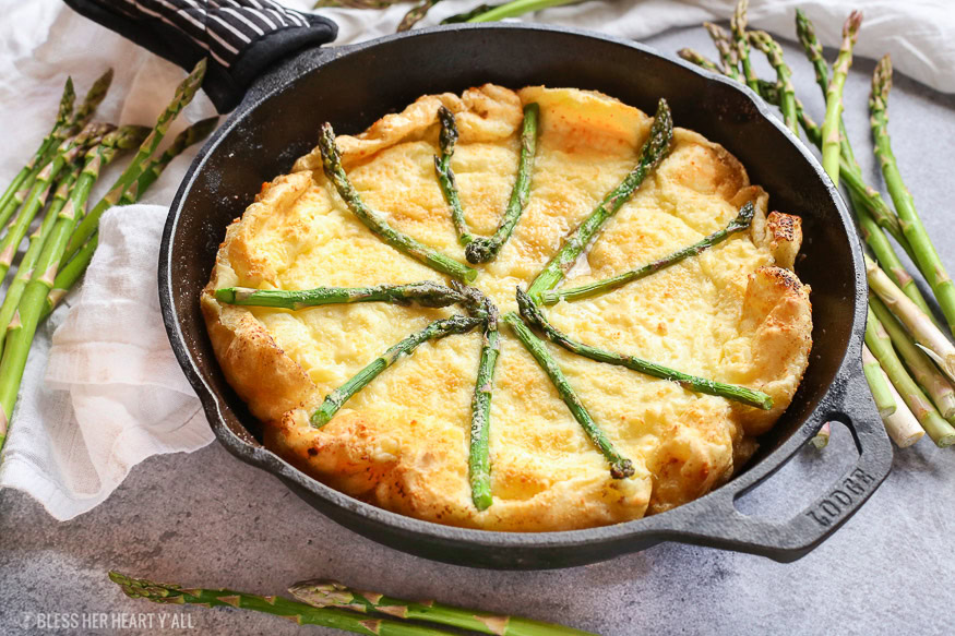 gluten free swiss asparagus dutch baby is the most moist, smooth, doughy and cheesy dutch baby and so easy to make! Just bake for 12-15 minutes!