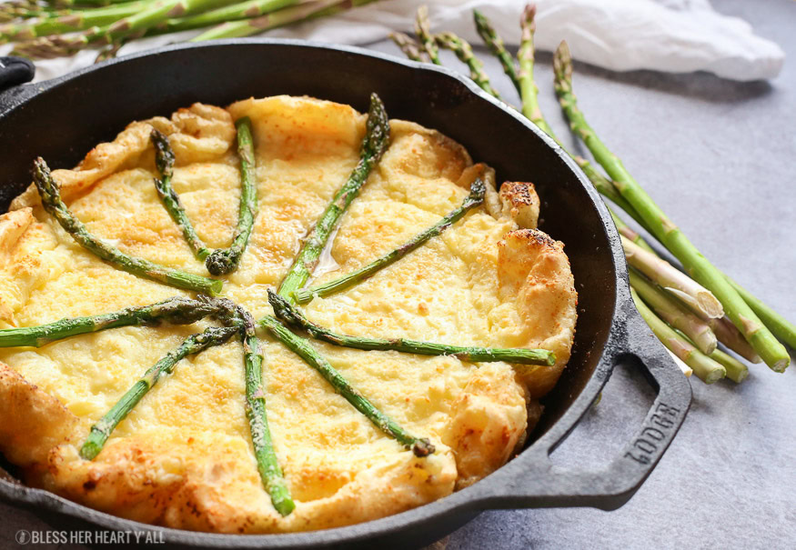 gluten free swiss asparagus dutch baby is the most moist, smooth, doughy and cheesy dutch baby and so easy to make! Just bake for 12-15 minutes!