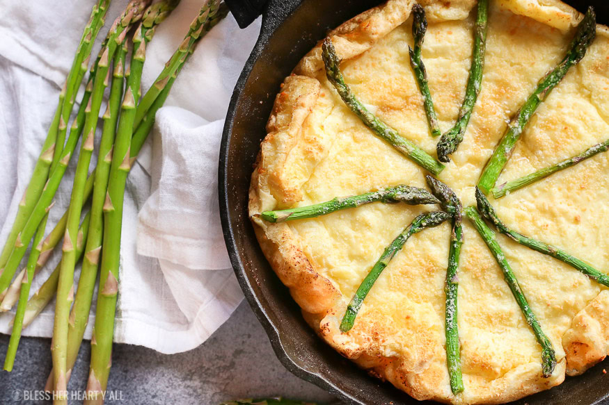 gluten free swiss asparagus dutch baby is the most moist, smooth, doughy and cheesy dutch baby and so easy to make! Just bake for 12-15 minutes!