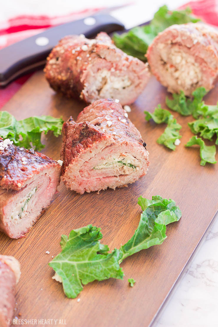 These grilled spicy steak pinwheels use a mixture of cotija cheese, grape tomatoes, pepper flakes, and arugula leaves all wrapped up in some yummy thinly-sliced steak. The drooling starts now! www.BlessHerHeartYall.com