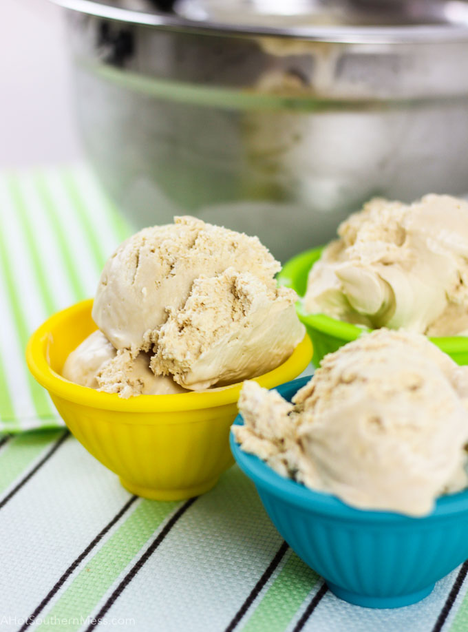 5 easy ingredients and 5 minutes of prep work with a hand mixer to make an extremely soft and creamy ice cream with dark brown sugar and infused with bourbon. It's the perfect summer treat, sprinkled with your favorite toppings. The bourbon helps keep the ice cream very soft {because the liquor doesn't entirely freeze} straight out of the freezer for immediate snacking. No waiting needed!