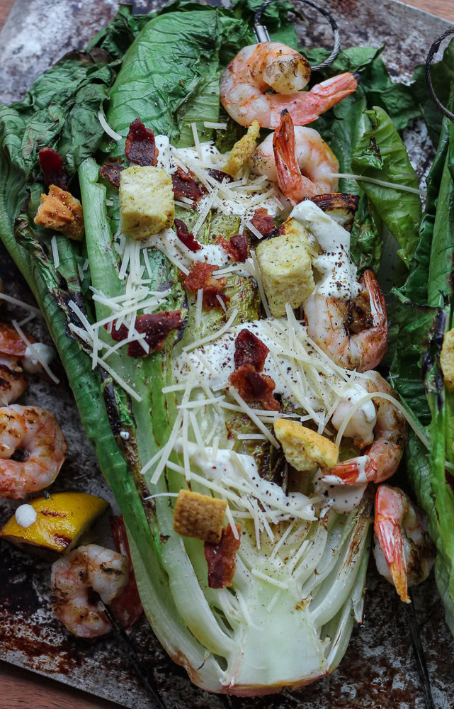 This Grilled Shrimp + Chicken Caesar Salad is so easy and tasty for a healthy summer meal! This recipe can be found at www.ahotsouthernmess.com