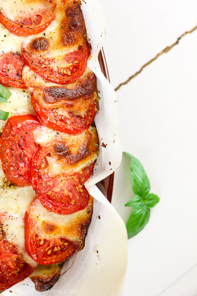 What an easy and lightened up casserole that's perfect for summer! This is the best casserole I've had! A cheesy caprese quinoa casserole with fresh juicy tomatoes, soft melted mozzarella cheese, fluffy protein-packed quinoa, and delicious basil pieces. Thrown in the oven to melt the flavors together and then drizzled with a simple balsamic reduction to make a caprese casserole masterpiece that anyone can make for an easy weeknight meal. www.ahotsouthernmess.com