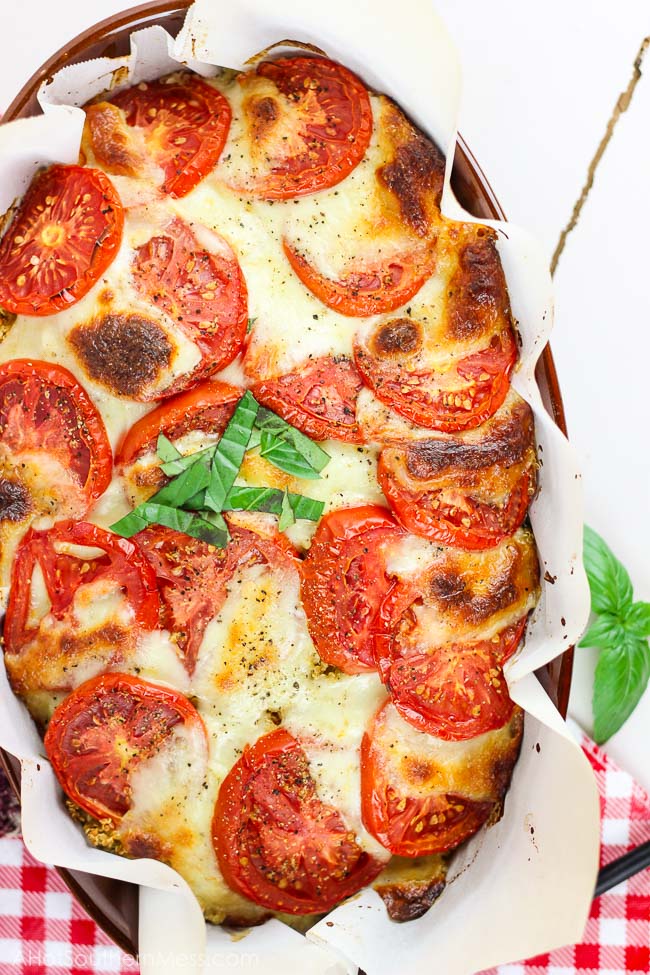 What an easy and lightened up casserole that's perfect for summer! This is the best casserole I've had! A cheesy caprese quinoa casserole with fresh juicy tomatoes, soft melted mozzarella cheese, fluffy protein-packed quinoa, and delicious basil pieces. Thrown in the oven to melt the flavors together and then drizzled with a simple balsamic reduction to make a caprese casserole masterpiece that anyone can make for an easy weeknight meal. www.ahotsouthernmess.com