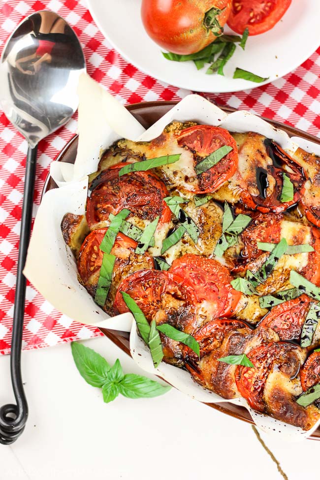 What an easy and lightened up casserole that's perfect for summer! This is the best casserole I've had! A cheesy caprese quinoa casserole with fresh juicy tomatoes, soft melted mozzarella cheese, fluffy protein-packed quinoa, and delicious basil pieces. Thrown in the oven to melt the flavors together and then drizzled with a simple balsamic reduction to make a caprese casserole masterpiece that anyone can make for an easy weeknight meal. www.ahotsouthernmess.com