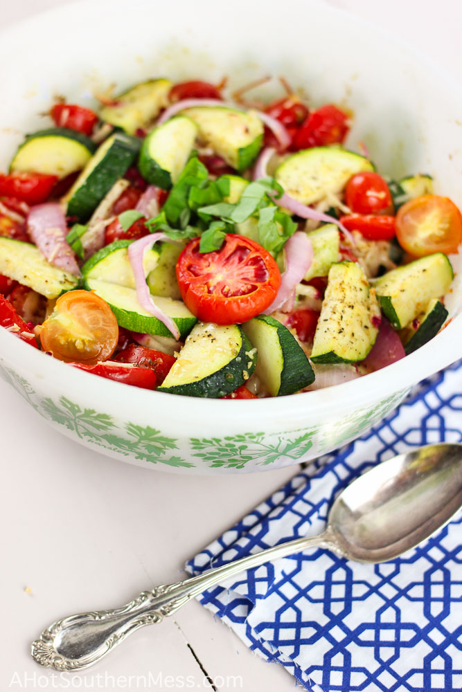 A light and fresh baked vegetable dish that's the perfect accompaniment to any weeknight summer meal. In less than 30 minutes, you can have a garlicky, cheesy, and satisfying dish that's actually very healthy (vegetarian and gluten-free), your family won't even know what happened! www.ahotsouthernmess.com