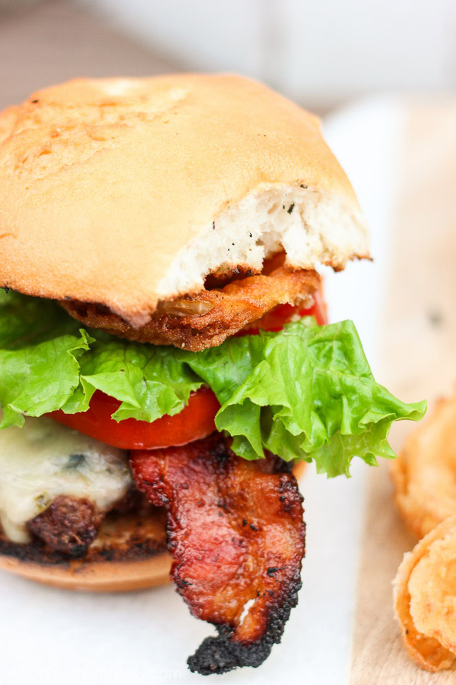 Oh my gosh, this burger looks so good! I have got to try it! Ooey gooey pepper jack cheese is stuffed inside juicy ground beef patties along with fresh bites of crisp spicy jalapeños. The burgers are kissed on the grill long enough to cook to your liking and then stacked on top of a fluffy bun, and then loaded with fresh crisp slices of lettuce and tomato, BBQ bacon, and homemade buttermilk onion rings. www.ahotsouthernmess.com