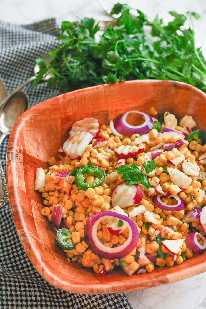 chipotle lime salad in wooden bowl