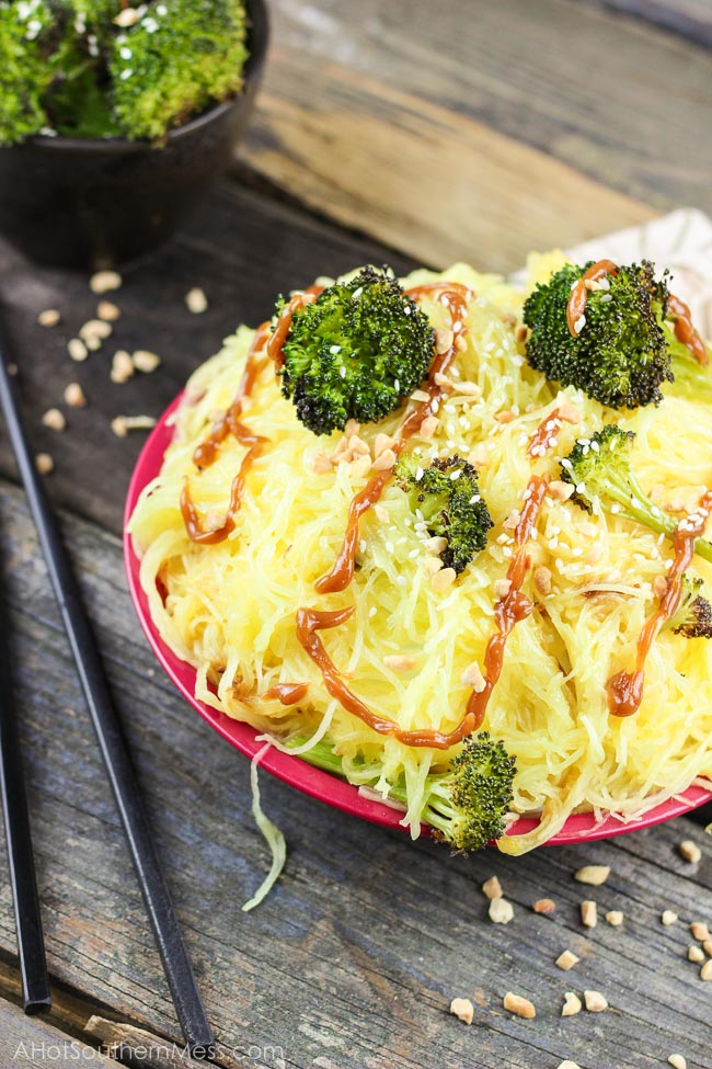 Spicy Peanut Spaghetti Squash A creamy sweet and spicy peanut sauce is drizzled over crispy and tender roasted broccoli and spaghetti squash. Add in your favorite protein, like grilled chicken breasts if you’d like. It’s the perfect easy 30-minute meal combination of Asian meets healthy! www.ahotsouthernmess.com