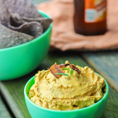 This gluten-free spicy pumpkin bacon dip is the perfect party snack to bring to your next fall party, tailgate, or couch snack. This spicy dip combines the healthy creaminess of greek yogurt cream cheese and pumpkin, with the heartiness of the cheese and bacon, and the spice of garlic, green onion, and cayenne pepper. Put this lightened up dip out with your favorite dippers and it will be gone in seconds. www.ahotsouthernmess.com