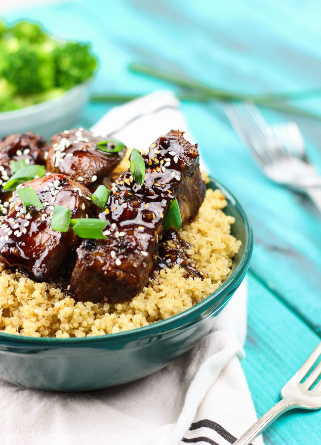 Spicy sticky asian ribs are drizzled in sweet and spicy glaze, kissed to a slight crunch on the grill, and melt-in-your-mouth, incredibly tender on the inside. These pork ribs are finger-lickin' and slap yo mama silly kind of 'good'. www.ahotsouthernmess.com