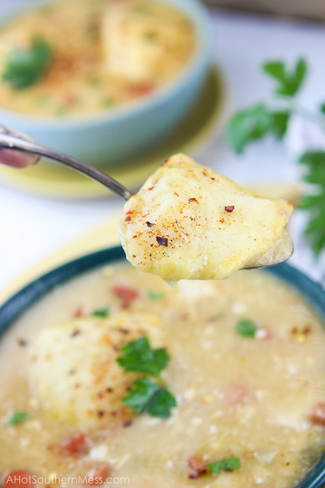 This spicy gluten-free slow cooker chicken and dumplings recipe is so easy to put together, you need just 5 minutes, and let simmer all day. The spicy taste {easily adjusted to your spice level!} pairs well with the sweet doughy gluten-free dumplings and tender bites of chicken and vegetables. Perfect for a busy fall weeknight that the whole family will love, just serve and enjoy! www.ahotsouthernmess.com