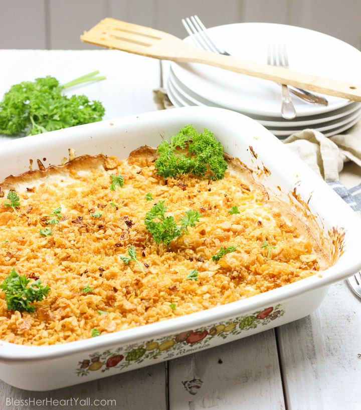 This is the best gluten-free corn souffle in the entire world {and is so easy to put together and throw in the oven!}! Creamy cheesy gluten-free ingredients are mixed and melted together, baked to sweet perfection with sweet crunchy toppings on top! www.blessherheartyall.com
