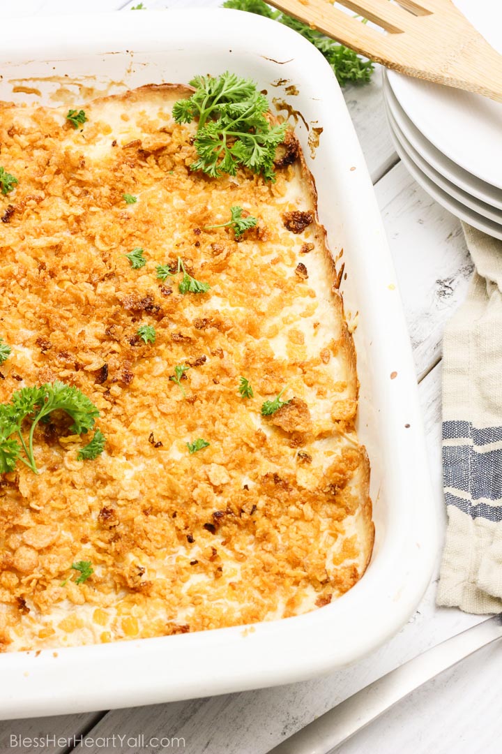 This is the best gluten-free corn souffle in the entire world {and is so easy to put together and throw in the oven!}! Creamy cheesy gluten-free ingredients are mixed and melted together, baked to sweet perfection with sweet crunchy toppings on top! www.blessherheartyall.com