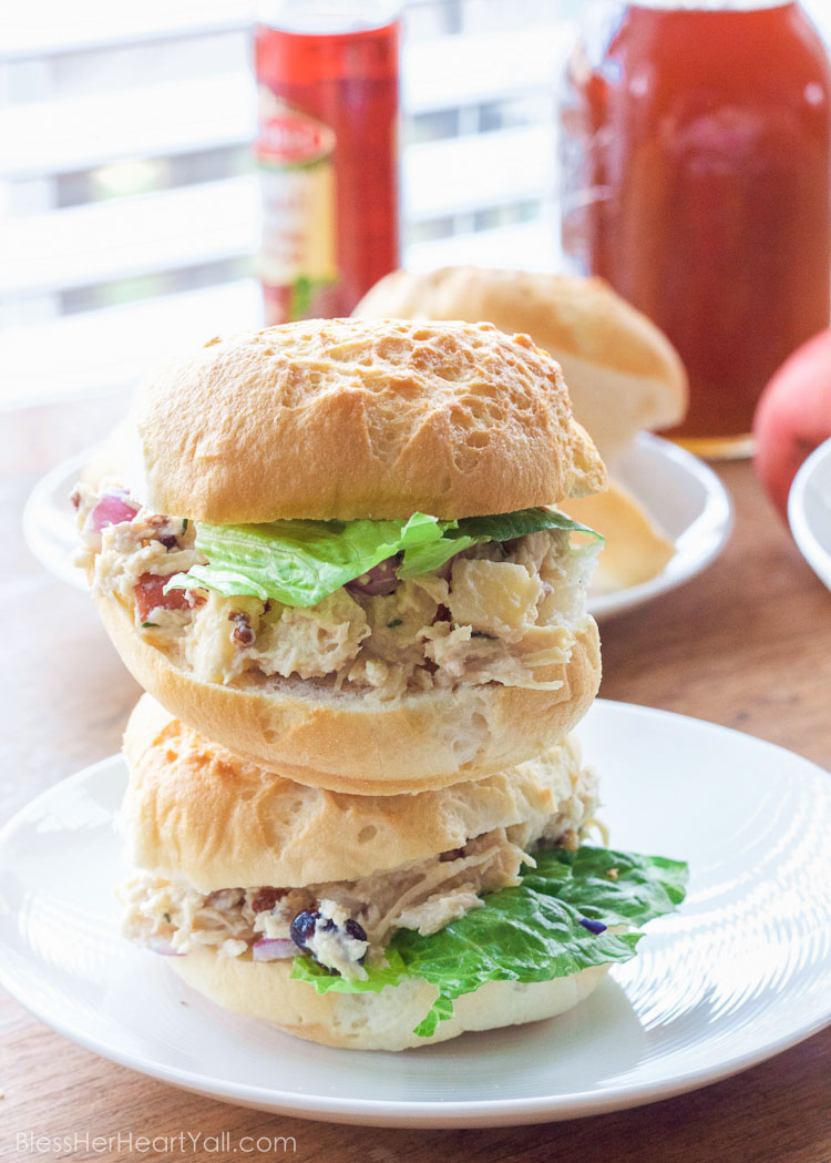 OMG yum! This rosemary greek yogurt chicken salad is a light and fresh (and gluten-free!) approach to chicken salad! The list of healthy ingredients come together to make one sweet and savory masterpiece of a salad or gluten free sandwich!