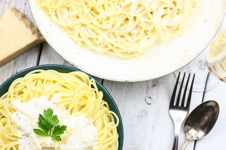 This Skinny Champagne Alfredo recipe is amazing and quick to make! Instead of those heavy unhealthy creams, healthy greek yogurt is used! And if we needed a reason to use up extra New Year's Eve champagne, here it is! It is used in lieu of chicken broth or white wine in the typical alfredo sauce! Cream, healthy, fun deliciousness! www.blessherheartyall.com